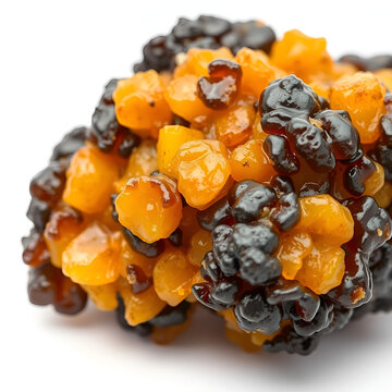 Macro closeup of Organic Indian bdellium or Guggul resin (Commiphora wightii) isolated on white background.