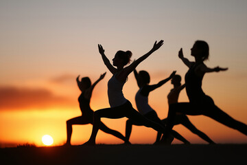 Close up, Group of women practicing yoga 