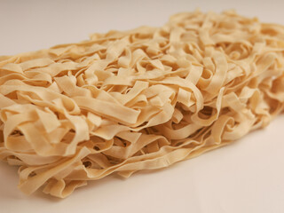 Dry instant noodles on white background