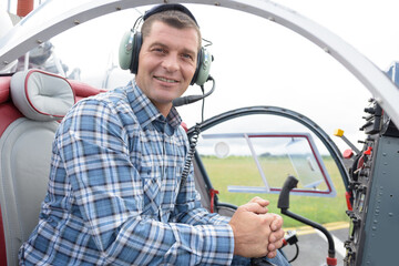 a man in a helicopter © auremar