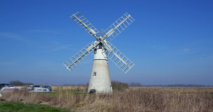 Wide shot of Thurne mill, on the river Thurne,