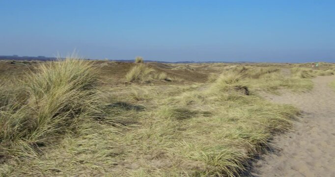 Panning Shot looking across the coastal path and winterton dunes next to Winterton on Sea,