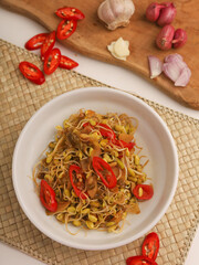 Stir fry mung beans sprout with garlic and chili on white background