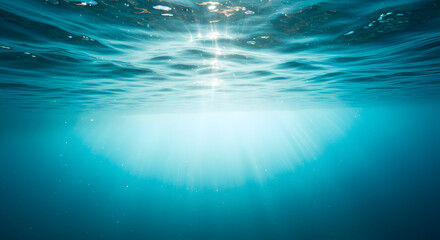 Sunlight Streams Through Rippling Ocean Waves Underwater Scenery