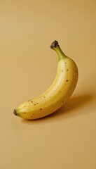 Fresh Yellow Banana on Smooth Beige Background with Natural Texture