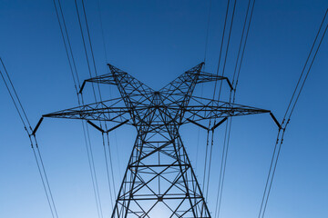 high voltage power lines in the morning hours