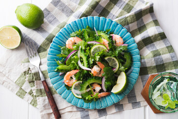 【ゴーヤと海老のサラダ】夏野菜の王様ゴーヤとたっぷりのパクチーに海老を和えたシンプルなサラダ。ライムを絞って爽やかに楽しみます。