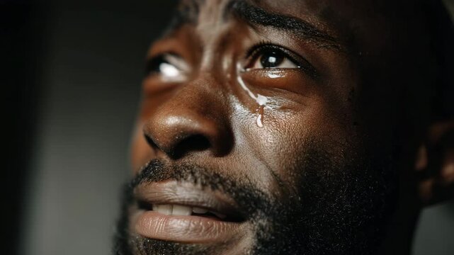 Moody sad crying guy portrait. Concept of mental health. Lonely depressed man feel despair, anxiety. Bad day, problems. Grief, terrible tragic loss. Male tears. Frustrated human face close up.