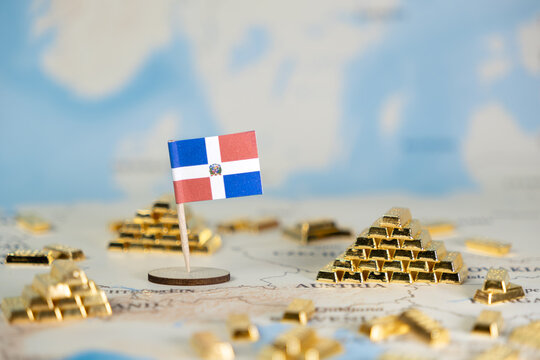 Dominican Republic flag on a world map with scattered gold bars, symbolizing national economic prosperity, global resources, and investment potential with copy space - Powered by Adobe