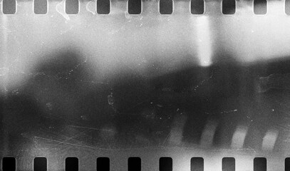 vintage black and white film frame texture with grainy light leak overlay for retro web design,...