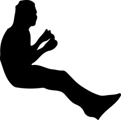 Silhouette of a woman sitting and eating rice