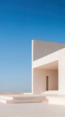 現代的な建築デザイン 白い砂漠の背景に青い空 幾何学的な形状のエントランスとテラス 太陽の下でのシンプルでミニマルなデザイン