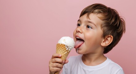 Happy boy licking white vanilla ice cream cone on pink background. Child in white shirt sticking tongue out enjoying frozen dessert. Summer treats and childhood happiness concept. Frozen dessert sale