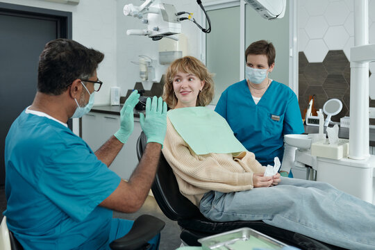 Dentist Giving Recommendations After Treatment