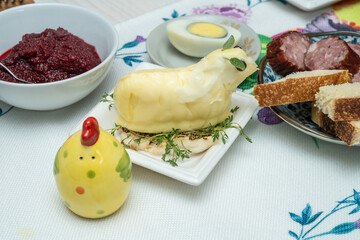 Butter lamb is a traditional butter sculpture accompanying the Easter meal for many Russian, Slovenian and Polish Catholics. Butter is shaped into a lamb either by hand or in a lamb-shaped mold.