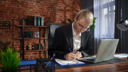 Focused Professional Writing Notes in Modern Office