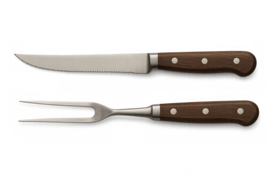 Steak cutlery set with serrated knife and carving fork on transparent background