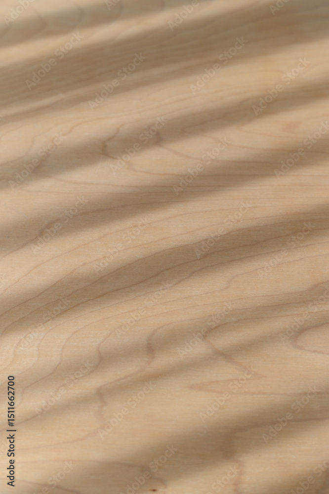 Poster Natural warm wood texture features diagonal shadows and parallel light stripes creating an abstract background pattern on smooth brown surface. detail shows subtle wood grain of organic material