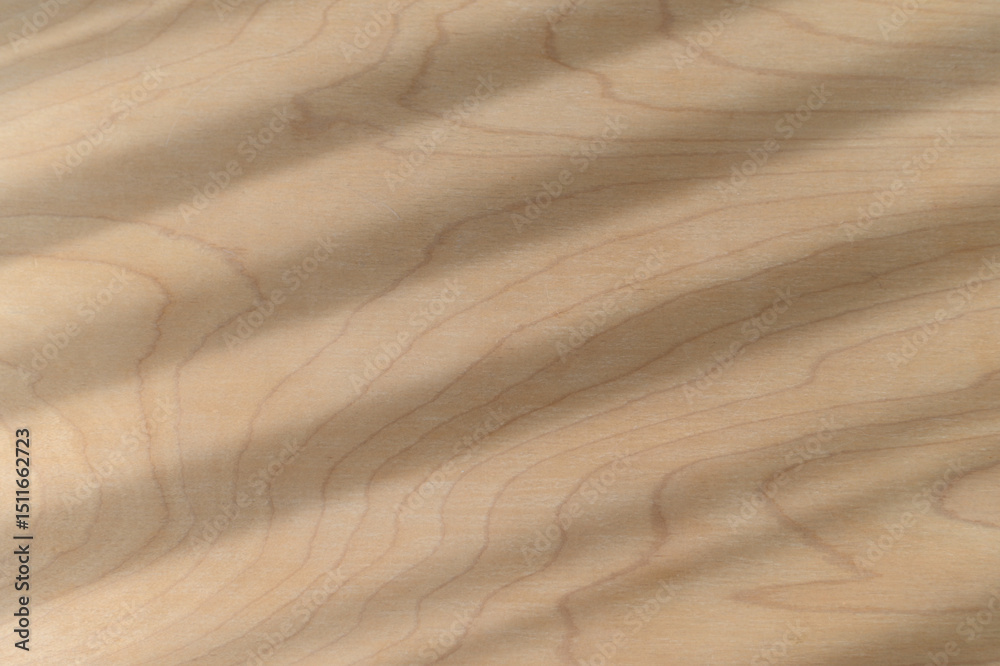 Poster light natural wood texture with fine grain provides warm surface background. diagonal shadow pattern