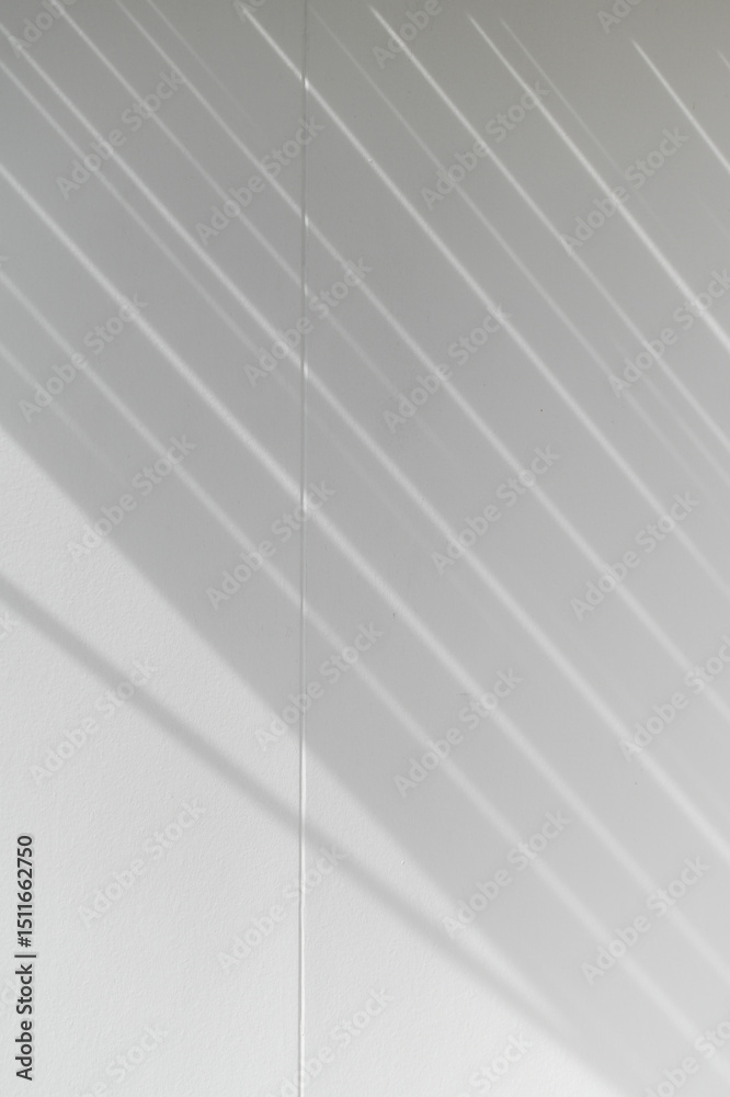 Poster Diagonal parallel lines of shadow create an abstract pattern on textured white wall. minimal design provides serene and calm background, perfect for design elements and artistic concepts