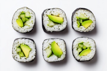Sushi rolls with fresh cucumber and creamy avocado artfully arranged on a pristine background showcase culinary creativity