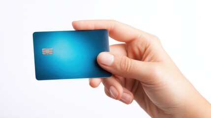 A hand holds a blue credit card