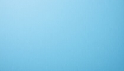a striking contrast between the deep blue of the sky and the soft gray of the land below