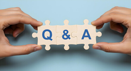 Q&A concept displayed on puzzle pieces, promoting interaction and inquiries. A close-up shot depicts two hands assembling a jigsaw puzzle with "Q&A" letters, emphasizing communication and dialogue