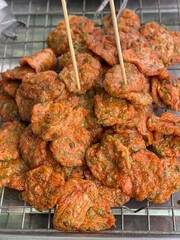 Deep Fried Fish Cake or fried fish-paste balls, Asian-style fishcakes usually contain fish with salt, water, flour and egg. Thai style food