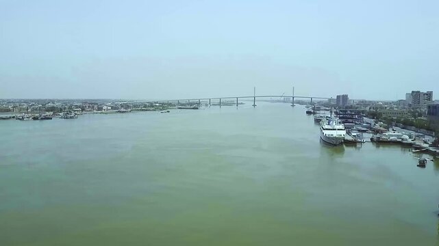 Drone Aerial Footage of Badr Shaker Al-Sayyab Statue Along the Shatt al-Arab River in Basrah, Iraq