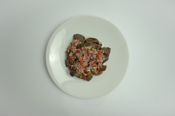 Fried gizzard and liver with matah sauce.