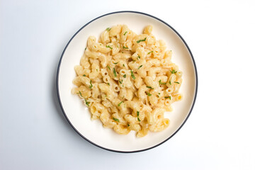 a plate of macaroni and cheese pasta isolated on white background
