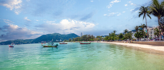The crescent sandy beach of Patong, Phuket, Thailand