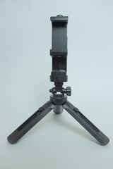 Mini tripod for Mobile Phone isolated  on white background.