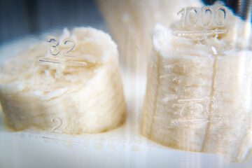 Preparing a milk drink in a blender, bananas.
