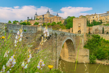 Alcantara Bridge, an arch bridge in Toledo, Spain