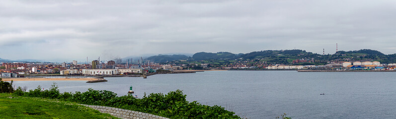 Naklejka premium Gijón is a vibrant coastal city in Asturias, Spain, known for its beaches, culture, and maritime heritage.
