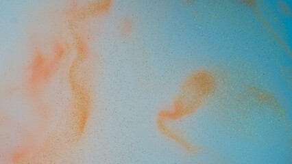 Soft abstract background with pastel blue and peach tones. Glittery specks create a dreamy, cosmic atmosphere. ideal for minimalist or ethereal design themes.