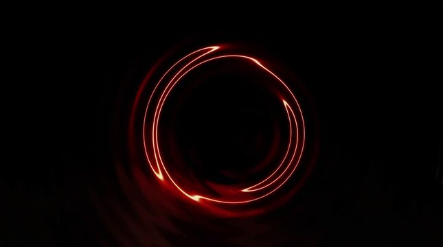 Abstract swirling red light patterns creating a mesmerizing visual effect against a dark background