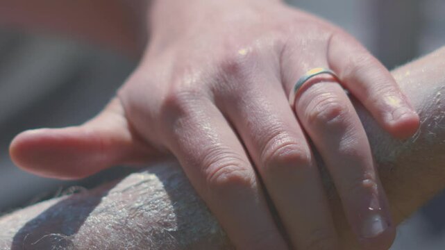 Suncream on Hairy Male Arm Being Rubbed In to Stop Sunlight from Causing Sunburn to Sensitive Skin from Harmful UV Rays. Dermatology Prevention Summer Footage.