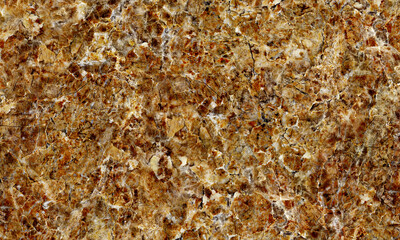 Emperador marble texture background, a golden brown-colored natural crackled surface with a rough stone texture pattern used for ceramic wall and flooring tile design.
