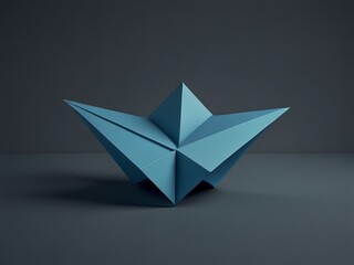Geometric paper art star sculpture in blue hue on a dark background displayed