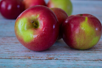 Close-up of juicy apples isolated on a light background – healthy eating and autumn fruits