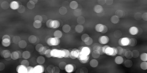 Abstract Soft Glowing and Soft Color Background. Gradient White Bokeh Background On dark Gray Background.