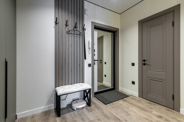 Contemporary Entryway with Mirror and Bench