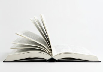 Obraz premium Open book pages fanning out isolated on white background