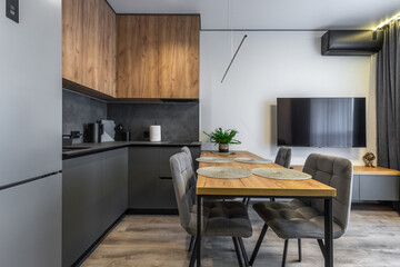 Sleek Corner Kitchen with Dining Table