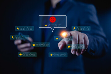 Customer Experience dissatisfied Concept. Unsatisfied customer, User via a smartphone reviews a 1-star rating, A man point to at icon 1 star, Negative feedback bad, bad service, Sadness emotion custom