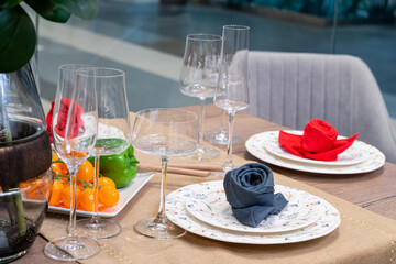 Elegant Table Setting with Folded Napkins and Glassware
