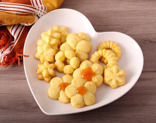 Spritz cookies in heart shaped  plate